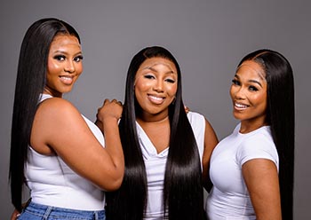 photo of three ladies in luxury wigs