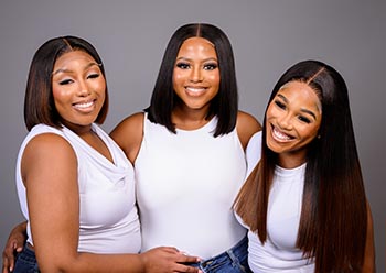 photo of three ladies in luxury wigs